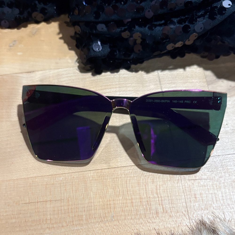 Stylish Purple Sunglasses. New in box.  Never worn